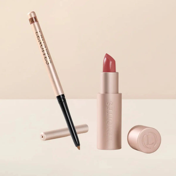 Sculpt and Hydrate Lip Duo by Lenoites featuring a Tinted Lip Balm in color berry, a Shape & Sculpt Lip Liner in color bare, elegantly arranged on a light beige background.