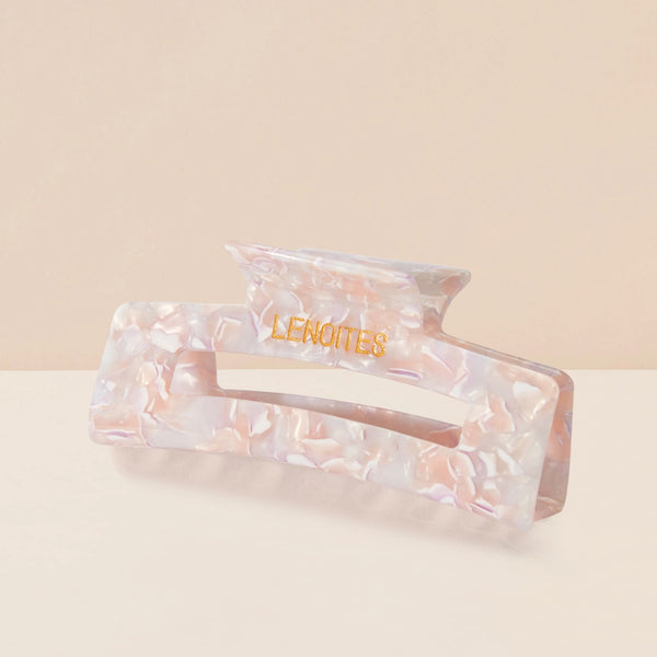 Eco-friendly Hair Claw Medium in Dusty Lavendel by Lenoites, featuring the brand logo in gold, displayed against a soft beige background.