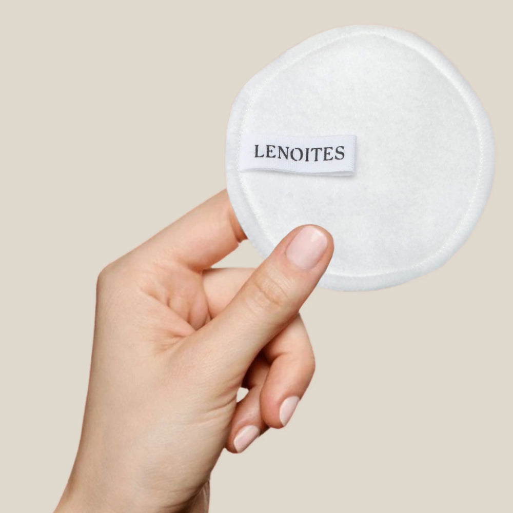 Pure Premium Organic Reusable Rounds Refill by Lenoites, featuring a peach-colored container with the brand logo, displayed against a beige background.