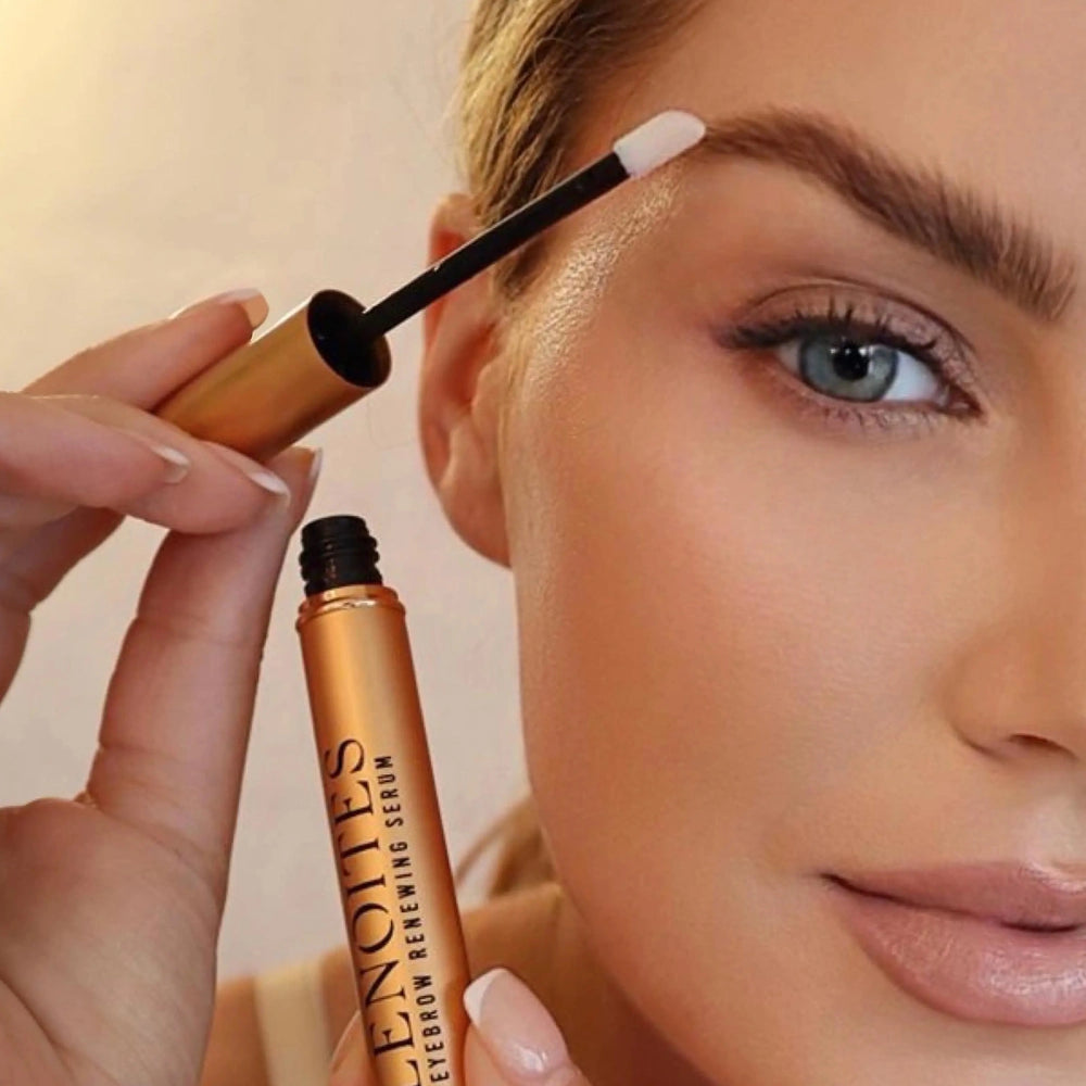 Sculpt and Grow Kit by Lenoites featuring a gold Eyebrow Growth Serum with a black applicator, a pink tweezers with a leather case, all displayed against a soft beige background.